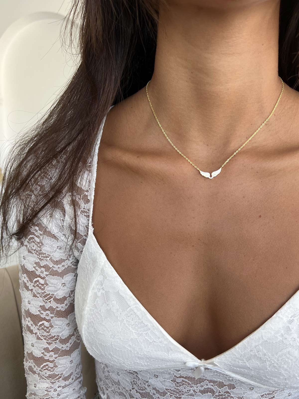 שרשרת צמודה כנפיים קטנות